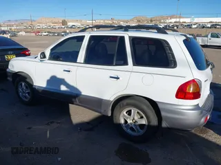 2002 Hyundai Santa Fe GLS with VIN KM8SC73D82U294374, listed as a IAAI auction lot 41204011 with 179,219 mi miles. Bid and sale history available at carsss.com. Image 15.