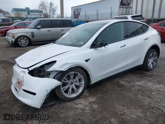 2022 Tesla Model Y Long Range with VIN 7SAYGAEE4NF516625, listed as a IAAI auction lot 41892225 with 33,054 mi miles and . Bid and sale history available at DreamBid. Image 17.