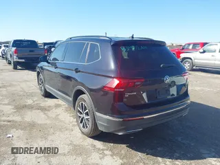 2020 Volkswagen Tiguan SE with VIN 3VV3B7AX0LM106561, listed as a IAAI auction lot 41712689 with 85,374 mi miles and . Bid and sale history available at DreamBid. Image 3.