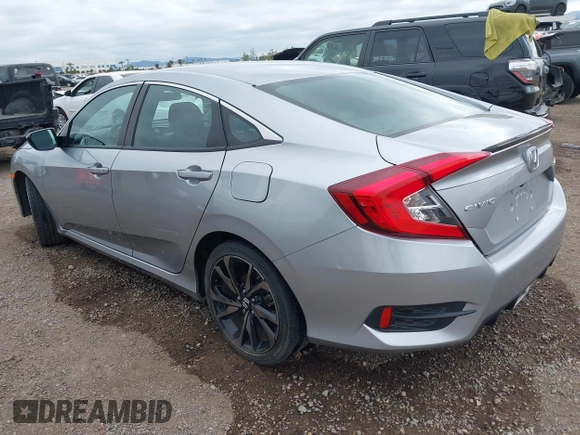2021 Honda Civic Sport with VIN 2HGFC2F83MH510243, listed as a IAAI auction lot 41856857 with 95,739 mi miles and . Bid and sale history available at DreamBid. Image 3.