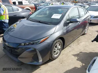 2021 Toyota Prius Prime LE with VIN JTDKAMFP9M3171321, listed as a IAAI auction lot 41464622 with NaN miles. Bid and sale history available at carsss.com. Image 2.