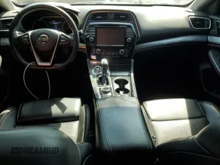 2017 Nissan Maxima SV with VIN 1N4AA6APXHC453803, listed as a Copart auction lot 52447455 with 132,270 mi miles and Salvage title. Bid and sale history available at DreamBid. Image 8.