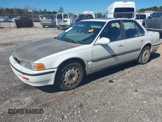 1992 Honda Accord LX with VIN JHMCB7659NC048944, listed as a IAAI auction lot 41704471 with 253,535 mi miles. Bid and sale history available at carsss.com. Image 2.