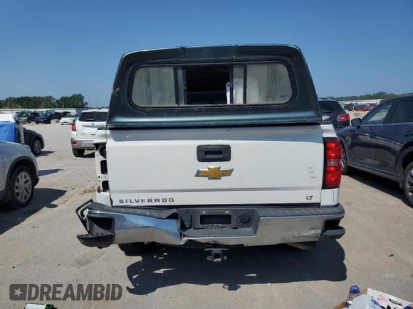 2014 Chevrolet Silverado 1500 LT with VIN 3GCPCREH7EG427915, listed as a Copart auction lot 65219244 with 127,778 mi miles and Salvage Title. Bid and sale history available at DreamBid. Image 6.