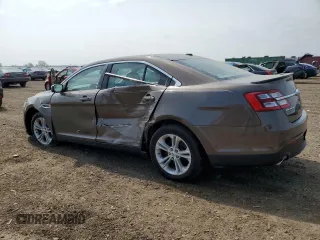 2015 Ford Taurus SEL with VIN 1FAHP2E82FG158662, listed as a Copart auction lot 58233875 with 159,174 mi miles and Salvage title. Bid and sale history available at DreamBid. Image 2.