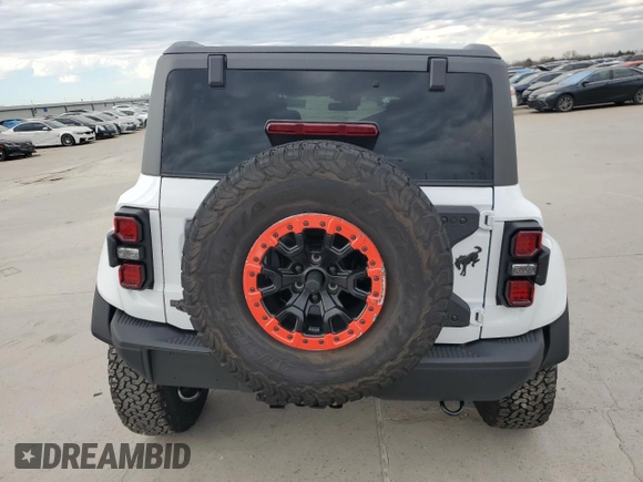 2024 Ford Bronco Raptor z VIN 1FMEE0RR0RLA38568, wystawiony jako Copart lot #41810505 z przebiegiem 168 mil mil oraz Szkoda całkowita • Salvage title. Historia ofert i sprzedaży dostępna na DreamBid. Obrazek 6.