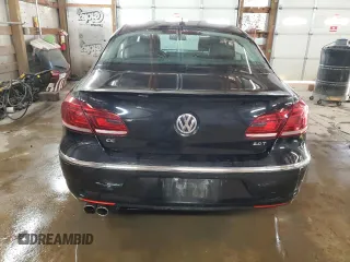 2014 Volkswagen CC R-Line with VIN WVWBN7AN3EE503237, listed as a Copart auction lot 77128394 with 84,995 mi miles and Salvage Title. Bid and sale history available at carsss.com. Image 6.