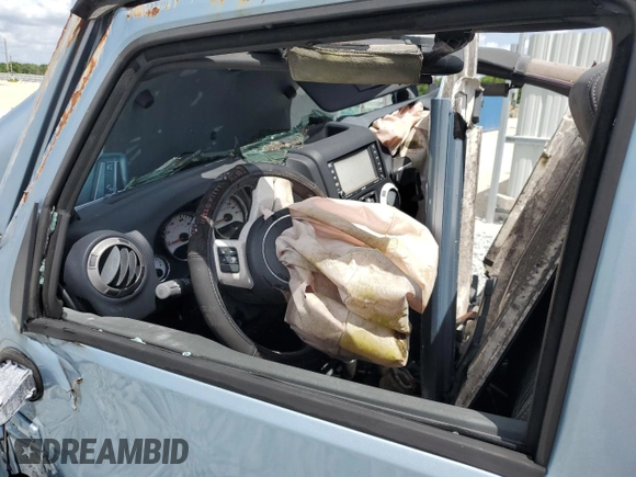 2012 Jeep Wrangler Unlimited Sahara with VIN 1C4BJWEG8CL174402, listed as a Copart auction lot 51831805 with Not provided miles and Non repairable. Bid and sale history available at DreamBid. Image 8.