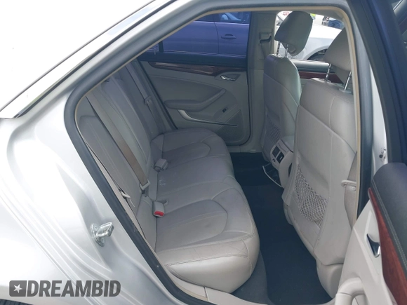 2010 Cadillac CTS Luxury with VIN 1G6DH5EG8A0150181, listed as a IAAI auction lot 42083380 with 110,678 mi miles and . Bid and sale history available at DreamBid. Image 8.