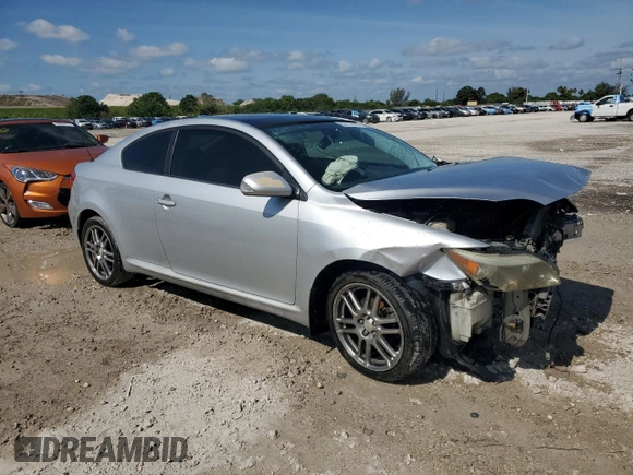 2005 Scion tC with VIN JTKDE177650059937, listed as a Copart auction lot 56122335 with 181,256 mi miles and Salvage Title. Bid and sale history available at DreamBid. Image 4.