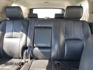 2014 Chevrolet Suburban LT with VIN 1GNSKJE71ER227075, listed as a Copart auction lot 76675654 with 214,113 mi miles and Salvage Title. Bid and sale history available at DreamBid. Image 10.