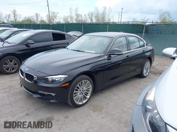 2012 BMW 3 Series 328i with VIN WBA3A5C59CF342687, listed as a IAAI auction lot 42116175 with 139,559 mi miles. Bid and sale history available at carsss.com. Image 2.
