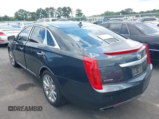 2013 Cadillac XTS Luxury с VIN 2G61P5S34D9183910, выставлен на аукционе IAAI как лот 42479531 с пробегом 160 798 миль миль и . История ставок и продаж доступна на DreamBid. Изображение 3.