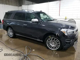 2022 Ford Expedition Platinum with VIN 1FMJU1MTXNEA47383, listed as a Copart auction lot 87005364 with 28,696 mi miles and Salvage title. Bid and sale history available at DreamBid. Image 4.