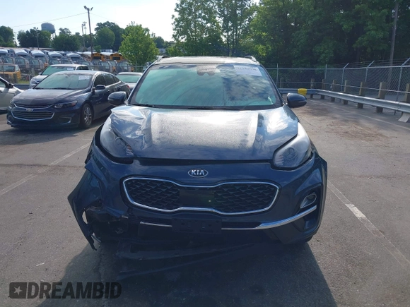 2021 Kia Sportage EX z VIN KNDPNCAC4M7897590, wystawiony jako IAAI lot #42183678 z przebiegiem 110 657 mil mil oraz . Historia ofert i sprzedaży dostępna na DreamBid. Obrazek 12.