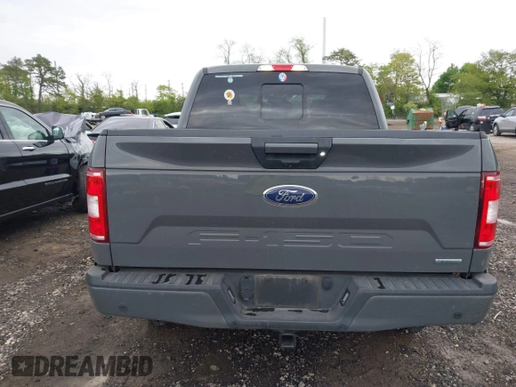 2018 Ford F-150 XL with VIN 1FTEW1EPXJFC85210, listed as a IAAI auction lot 42150759 with 97,660 mi miles and . Bid and sale history available at carsss.com. Image 16.