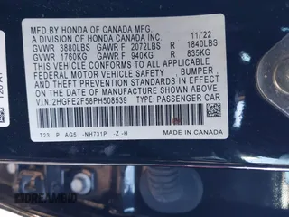 2023 Honda Civic Sedan Sport with VIN 2HGFE2F58PH508539, listed as a IAAI auction lot 41159810 with 64,294 mi miles. Bid and sale history available at carsss.com. Image 9.