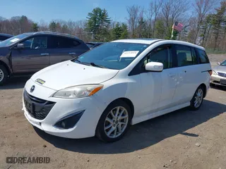 2013 Mazda Mazda5 Grand Touring with VIN JM1CW2DL7D0157980, listed as a IAAI auction lot 42114014 with 201,562 mi miles. Bid and sale history available at carsss.com. Image 2.