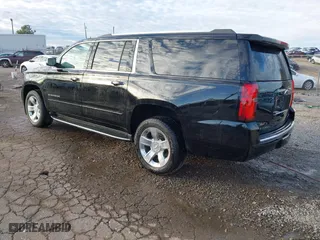 2020 Chevrolet Suburban Premier with VIN 1GNSCJKC0LR121728, listed as a IAAI auction lot 41105003 with 43,820 mi miles. Bid and sale history available at carsss.com. Image 3.