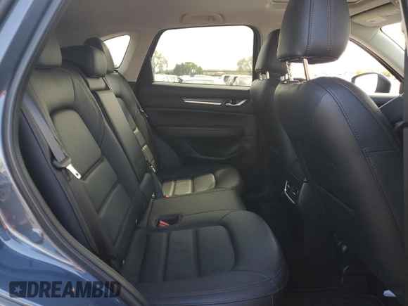 2024 Mazda CX-5 2.5 S Carbon Edition with VIN JM3KFBCL6R0422979, listed as a Copart auction lot 50939695 with 9,974 mi miles and Salvage Title. Bid and sale history available at carsss.com. Image 10.