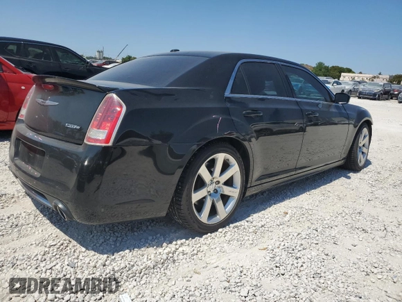 2012 Chrysler 300 SRT8 with VIN 2C3CCAFJXCH800724, listed as a Copart auction lot 49680465 with 87,279 mi miles and Salvage Title. Bid and sale history available at carsss.com. Image 3.