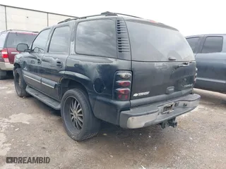 2003 Chevrolet Tahoe LT with VIN 1GNEC13Z13J297511, listed as a IAAI auction lot 41902595 with 293,195 mi miles. Bid and sale history available at carsss.com. Image 3.