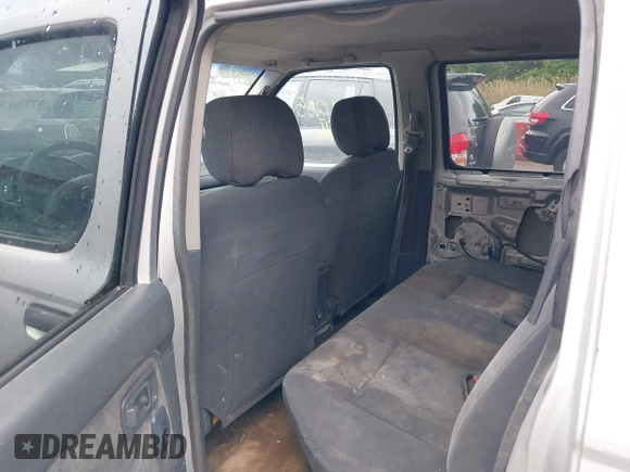 2004 Nissan Frontier XE z VIN 1N6ED29X04C402513, wystawiony jako IAAI lot #42241305 z przebiegiem 316 598 mil mil oraz . Historia ofert i sprzedaży dostępna na DreamBid. Obrazek 8.