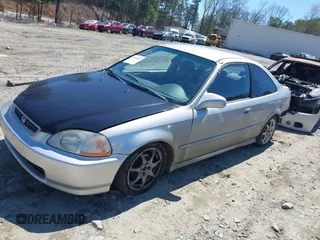 1998 Honda Civic DX with VIN 1HGEJ6123WL130983, listed as a IAAI auction lot 41836867 with 290,461 mi miles. Bid and sale history available at carsss.com. Image 2.
