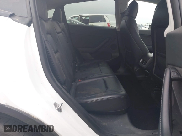 2022 Tesla Model Y Performance with VIN 7SAYGDEF0NF400560, listed as a IAAI auction lot 41783912 with 36,513 mi miles and . Bid and sale history available at DreamBid. Image 8.