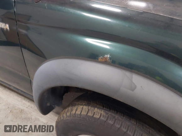 2003 Toyota Tacoma with VIN 5TEWN72N03Z166634, listed as a IAAI auction lot 41987641 with Not Provided miles. Bid and sale history available at carsss.com. Image 20.