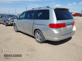 2008 Honda Odyssey Touring with VIN 5FNRL38918B059770, listed as a IAAI auction lot 41920865 with 231,599 mi miles. Bid and sale history available at carsss.com. Image 3.