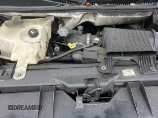 2003 Chevrolet Express Passenger с VIN 1GAHG35U131227037, выставлен на аукционе Copart как лот 85568344 с пробегом 248 121 миль миль и Списание • Salvage title. История ставок и продаж доступна на DreamBid. Изображение 14.