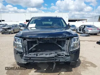 2015 Chevrolet Tahoe LT with VIN 1GNSCBKCXFR214072, listed as a IAAI auction lot 40512435 with 98,955 mi miles and . Bid and sale history available at DreamBid. Image 13.