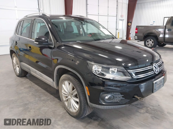 2012 Volkswagen Tiguan SE with VIN WVGBV7AX2CW503301, listed as a IAAI auction lot 42679407 with 90,603 mi miles and . Bid and sale history available at DreamBid. Image 1.