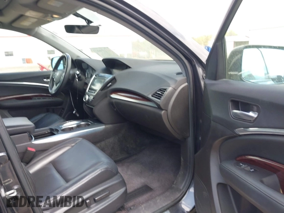 2016 Acura MDX with VIN 5FRYD3H23GB014967, listed as a IAAI auction lot 41929935 with 256,698 mi miles. Bid and sale history available at carsss.com. Image 5.
