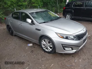 2014 Kia Optima LX z VIN 5XXGM4A75EG350283, wystawiony jako IAAI lot #42372526 z przebiegiem 110 937 mil mil oraz . Historia ofert i sprzedaży dostępna na DreamBid. Obrazek 1.