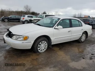 1999 Lincoln Continental with VIN 1LNHM97VXXY608466, listed as a Copart auction lot 45400935 with 155,333 mi miles and Salvage Title. Bid and sale history available at carsss.com. Image 1.
