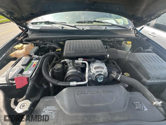 2004 Jeep Grand Cherokee Laredo with VIN 1J4GX48N24C436753, listed as a Copart auction lot 48782585 with 114,035 mi miles and Clean title. Bid and sale history available at DreamBid. Image 7.
