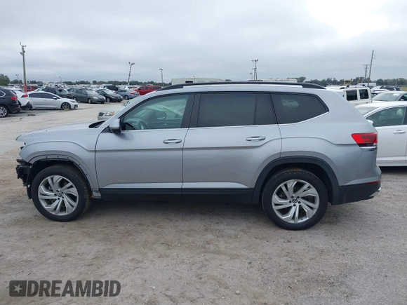 2021 Volkswagen Atlas SE with VIN 1V2JR2CA7MC556268, listed as a IAAI auction lot 41185525 with 73,724 mi miles and . Bid and sale history available at DreamBid. Image 15.
