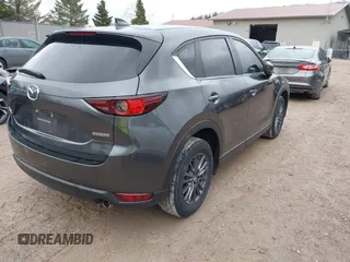 2020 Mazda CX-5 Touring with VIN JM3KFBCM2L0850855, listed as a IAAI auction lot 42147339 with 75,955 mi miles and . Bid and sale history available at carsss.com. Image 4.