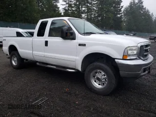 2003 Ford Super Duty F-250 XL with VIN 1FTNX21L63EC71321, listed as a Copart auction lot 83450654 with 112,486 mi miles and Salvage Title. Bid and sale history available at carsss.com. Image 4.
