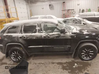 2016 Jeep Grand Cherokee Laredo with VIN 1C4RJFAGXGC311561, listed as a IAAI auction lot 41364024 with 134,042 mi miles. Bid and sale history available at carsss.com. Image 13.