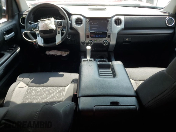 2021 Toyota Tundra SR with VIN 5TFUY5F11MX971951, listed as a Copart auction lot 64889875 with 69,297 mi miles and Salvage title. Bid and sale history available at DreamBid. Image 8.