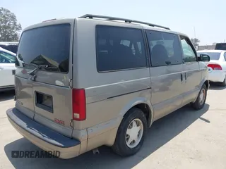 2001 GMC Safari z VIN 1GKDM19W21B502635, wystawiony jako IAAI lot #42368626 z przebiegiem 150 336 mil mil oraz . Historia ofert i sprzedaży dostępna na DreamBid. Obrazek 4.