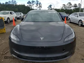 2024 Tesla Model 3 Long Range with VIN 5YJ3E1EB2RF825213, listed as a Copart auction lot 51909875 with 9,717 mi miles and Salvage Title. Bid and sale history available at DreamBid. Image 5.