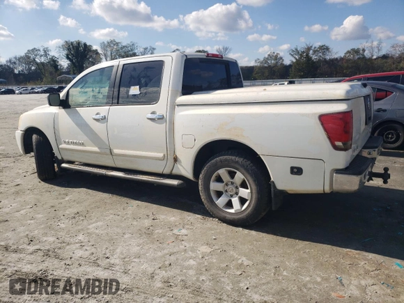 2005 Nissan Titan SE with VIN 1N6BA07B45N557451, listed as a Copart auction lot 80077824 with Not Provided miles and Salvage Title. Bid and sale history available at DreamBid. Image 2.