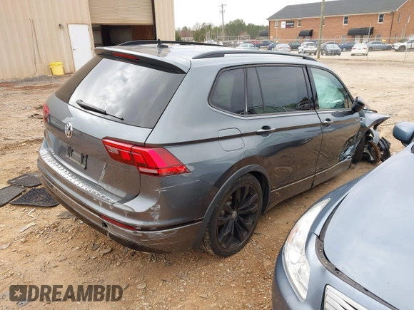 2020 Volkswagen Tiguan SE with VIN 3VV3B7AX7LM163193, listed as a IAAI auction lot 41751571 with 32,352 mi miles and . Bid and sale history available at DreamBid. Image 4.