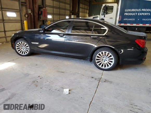 2012 BMW 7 Series 750i xDrive with VIN WBAKC6C56CC396851, listed as a Copart auction lot 64007085 with 149,218 mi miles and Clean title. Bid and sale history available at DreamBid. Image 2.