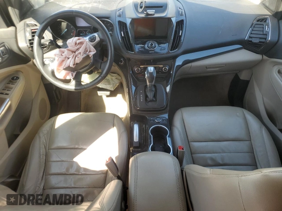 2016 Ford Escape Titanium with VIN 1FMCU9J95GUC74411, listed as a Copart auction lot 50061075 with 198,865 mi miles and Salvage Title. Bid and sale history available at DreamBid. Image 8.