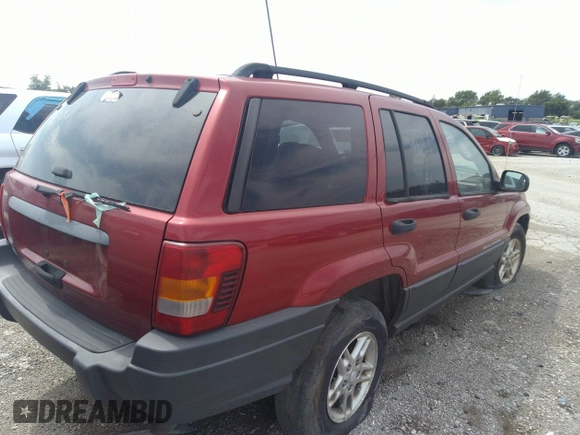 2004 Jeep Grand Cherokee Laredo with VIN 1J4GW48SX4C160475, listed as a IAAI auction lot 36500183 with 189,047 mi miles and . Bid and sale history available at DreamBid. Image 4.
